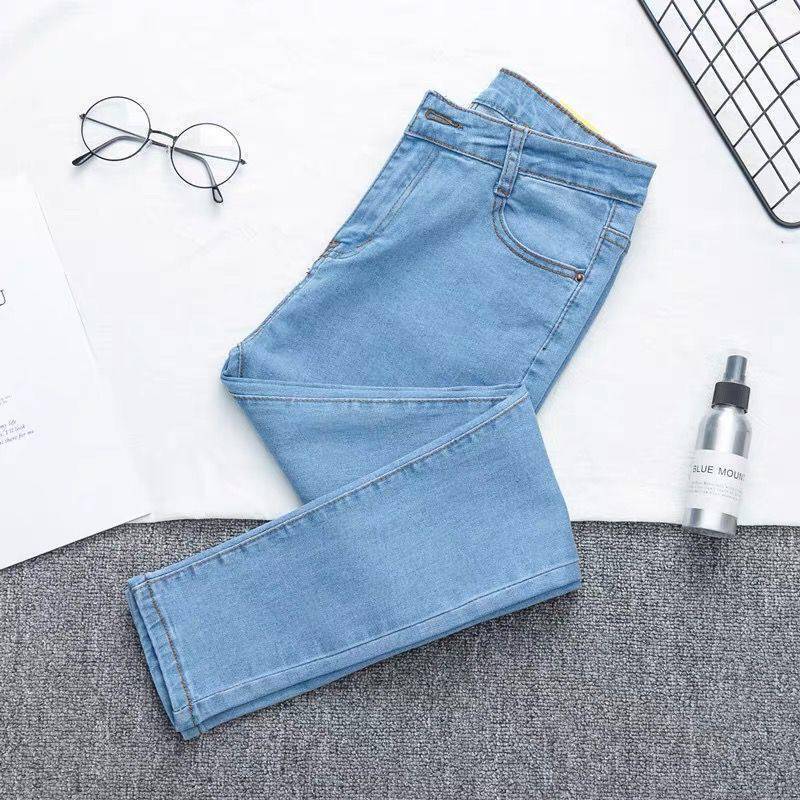 Close-up of the durable denim and cotton blend fabric of the trousers