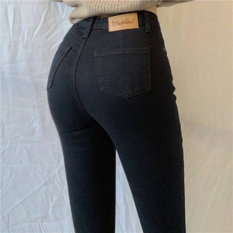 Back view of High-Waist Black Denim Trousers with a comfortable and flattering fit