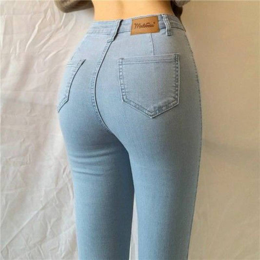 Back view of High-Waist Denim Trousers in a simple style, made from a denim and cotton blend