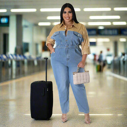 Model wearing a trendy long sleeve jumpsuit for plus-size women in an airport setting